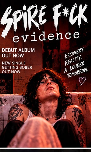 Spike F*ck leaning back in a tiled bathtub under red theatrical light, showcasing tattoos and dark hair.